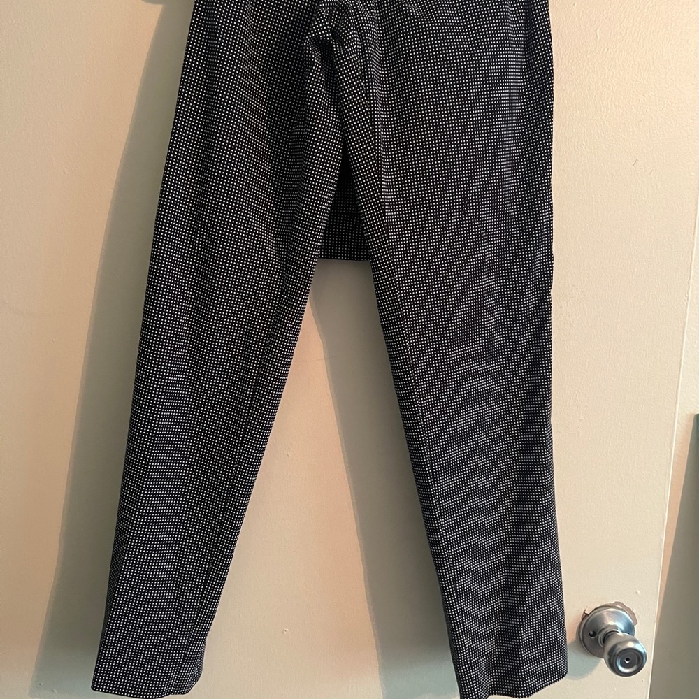 Black and white polka dot slacks